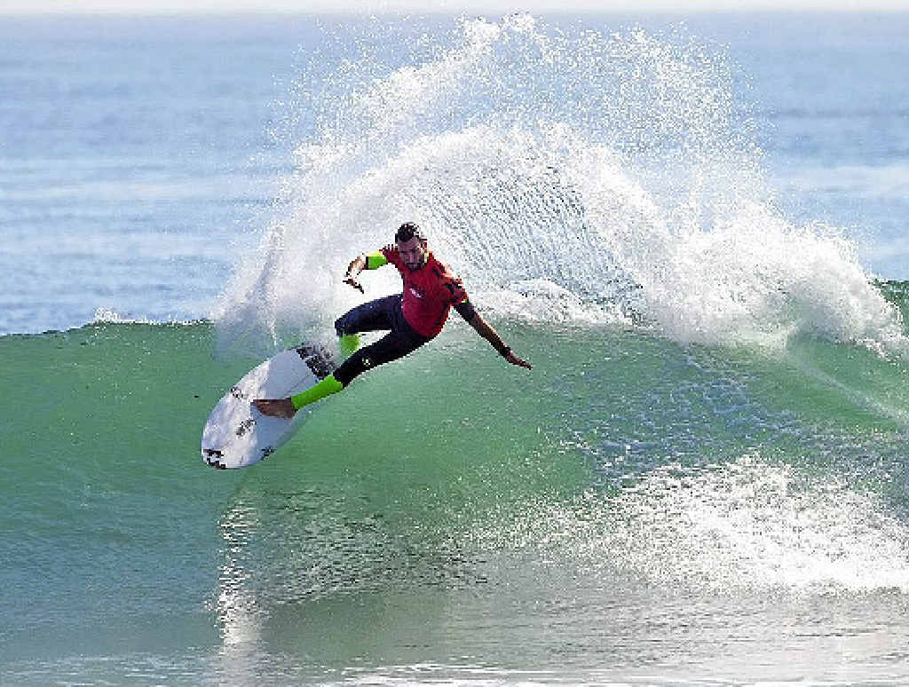 CHAMPION EFFORT: World champion Joel Parkinson puts it on edge before being bundled out of the Hurley Pro in California. CHAMPION EFFORT: World champion Joel Parkinson puts it on edge before being bundled out of the Hurley Pro in California.